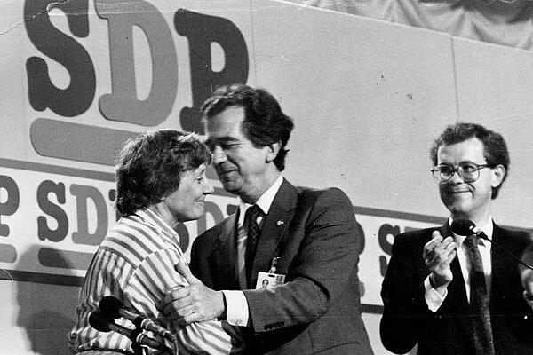 A photo of Shirley Williams and Bill Rogers at a Social Democratic Party event.